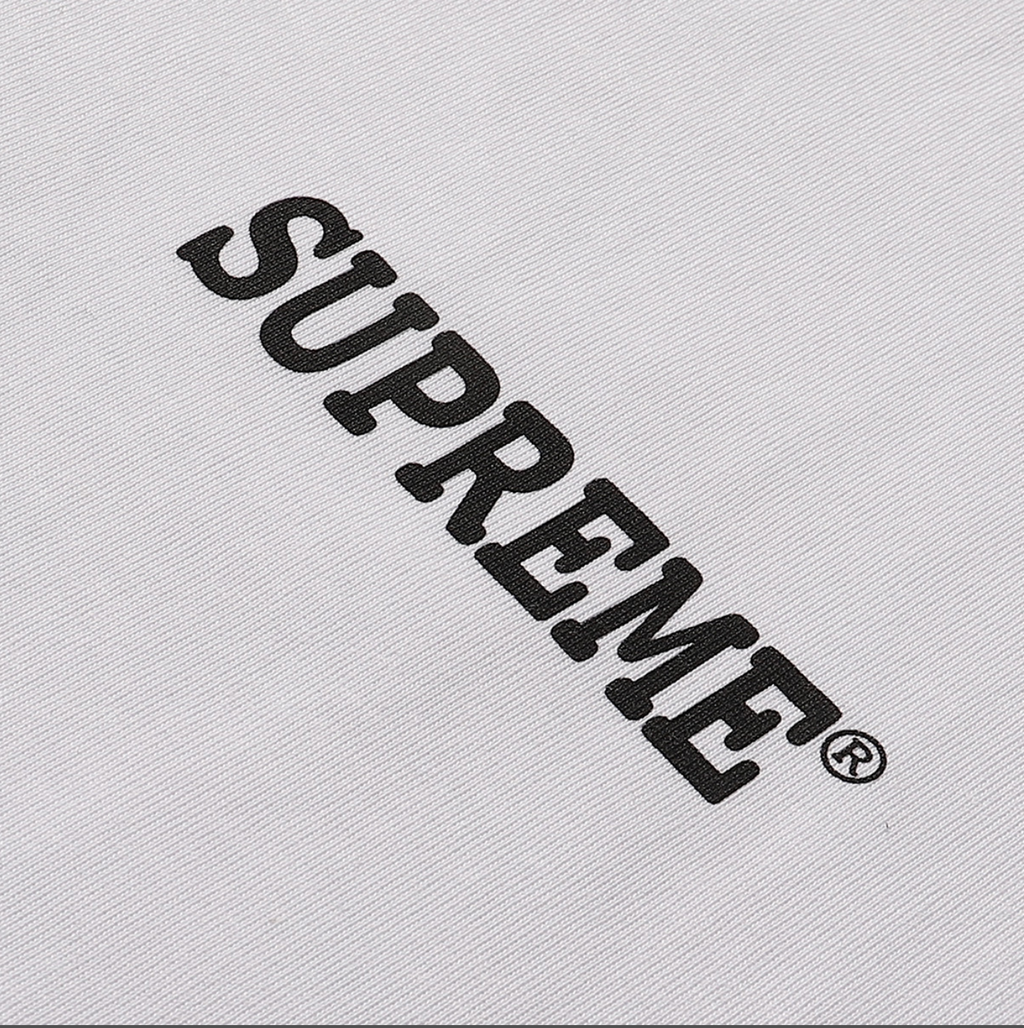 PLAYERA SUPREME PATCHWORK