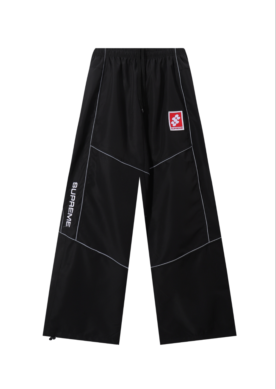 PANTS SUPREME REFLECTANTE