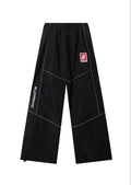 PANTS SUPREME REFLECTANTE