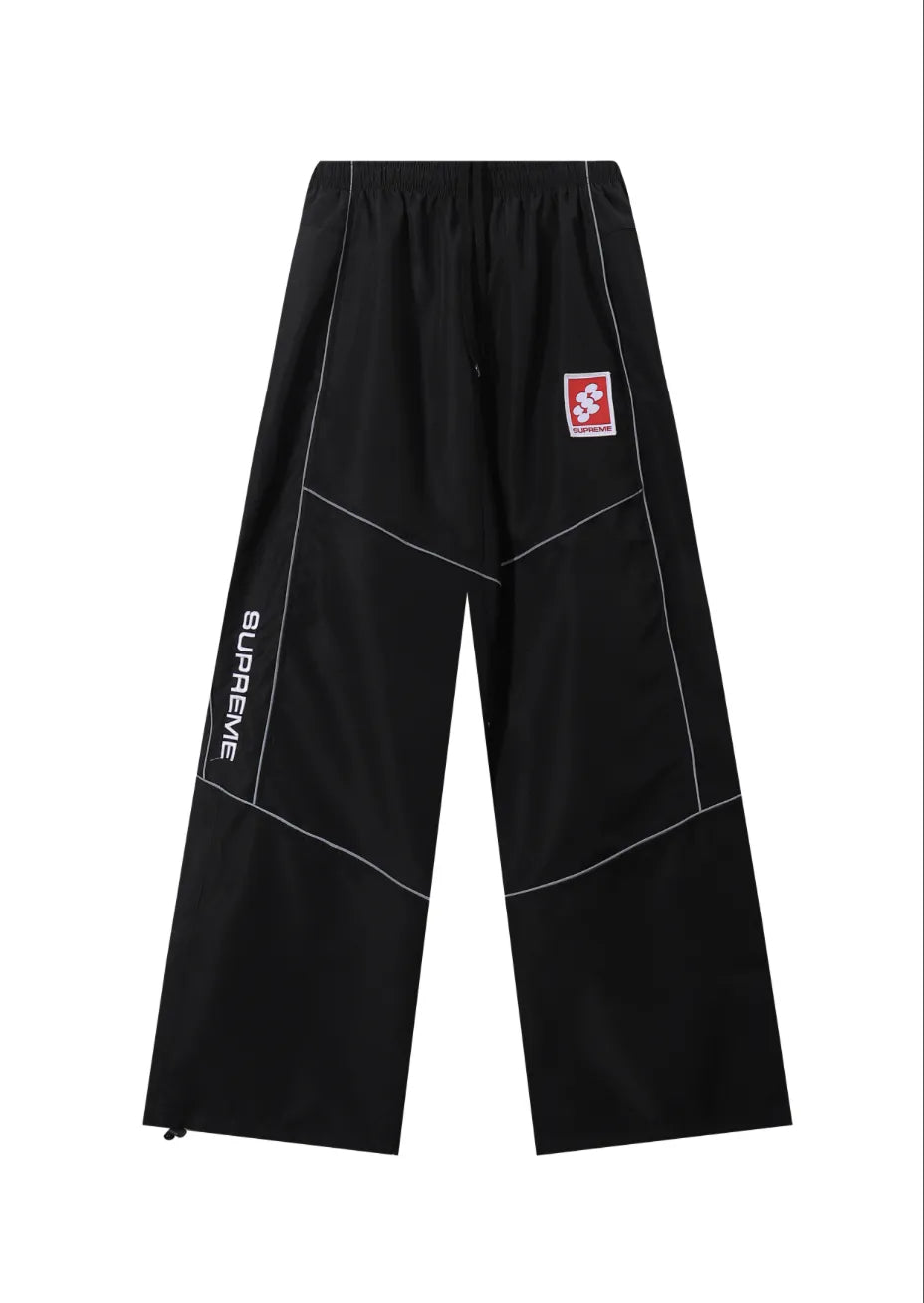 PANTS SUPREME REFLECTANTE