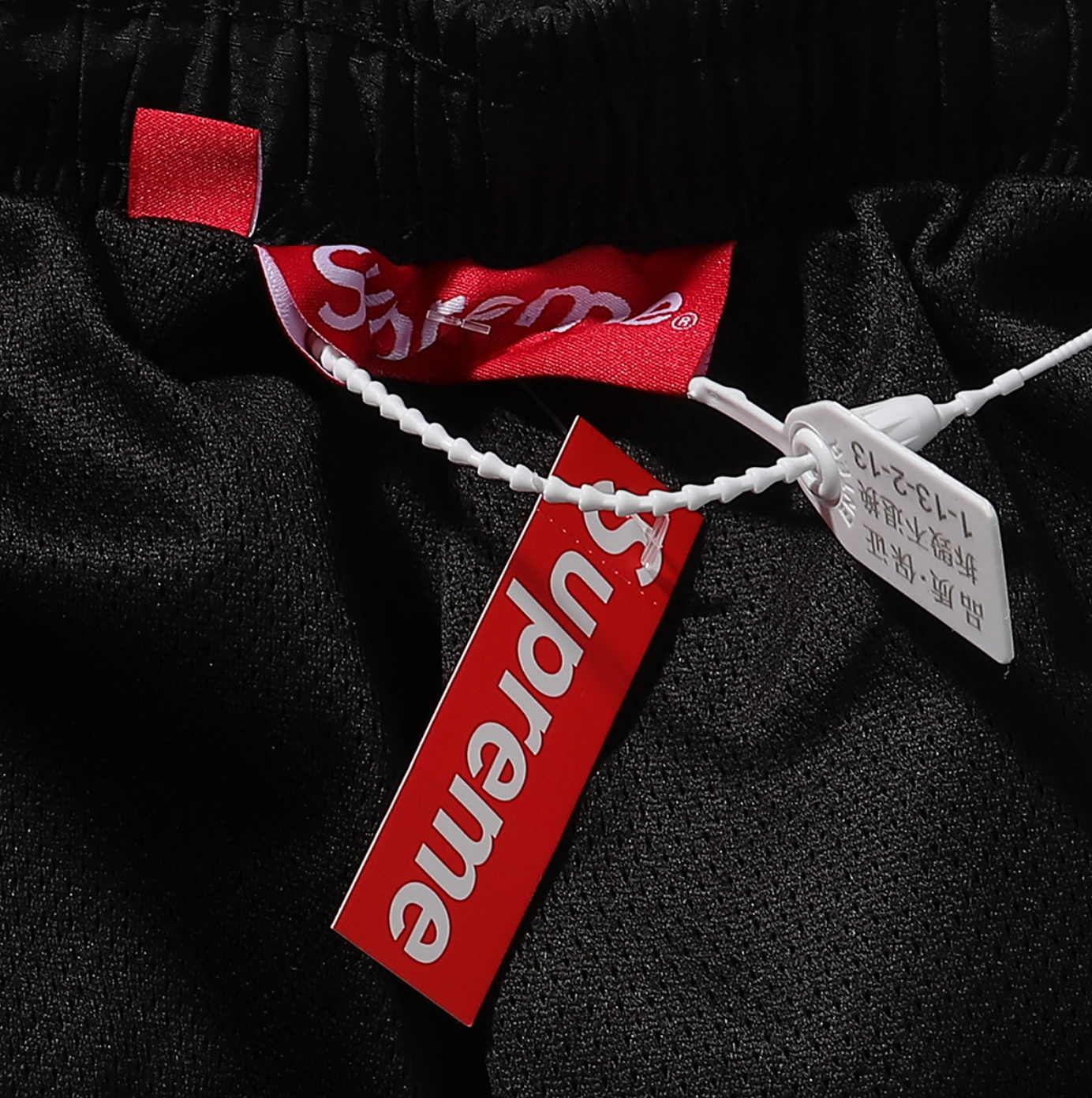 PANTS SUPREME REFLECTANTE