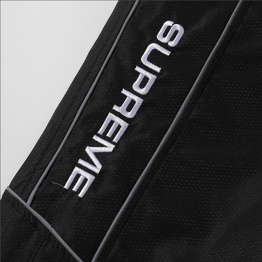 PANTS SUPREME REFLECTANTE