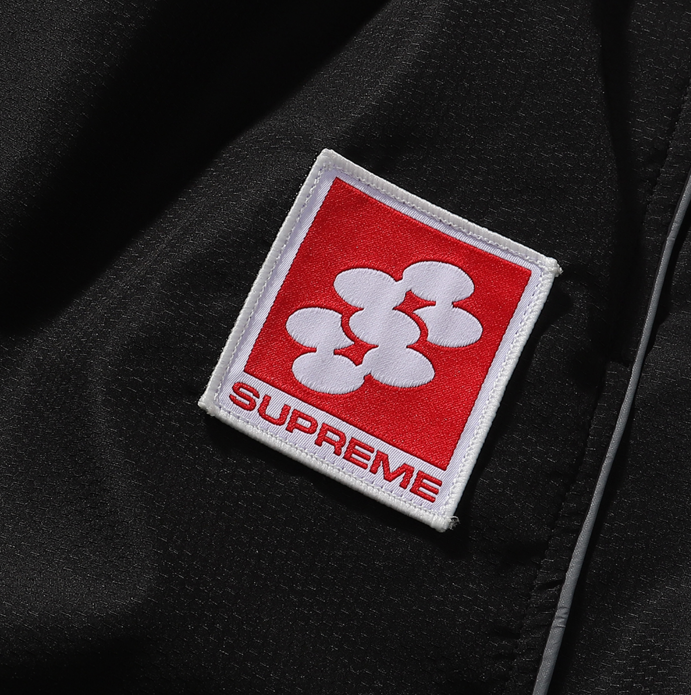 PANTS SUPREME REFLECTANTE