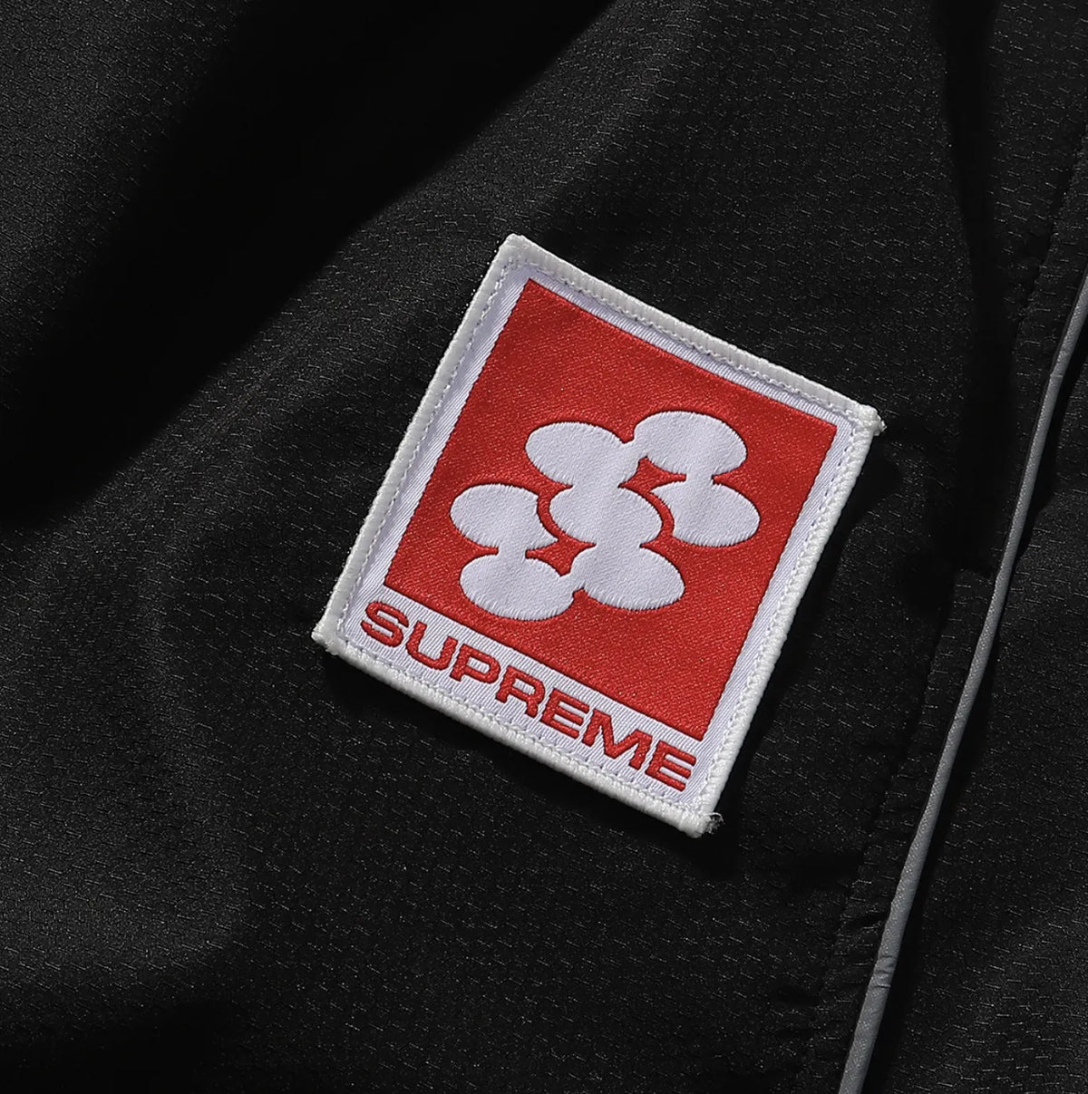 PANTS SUPREME REFLECTANTE