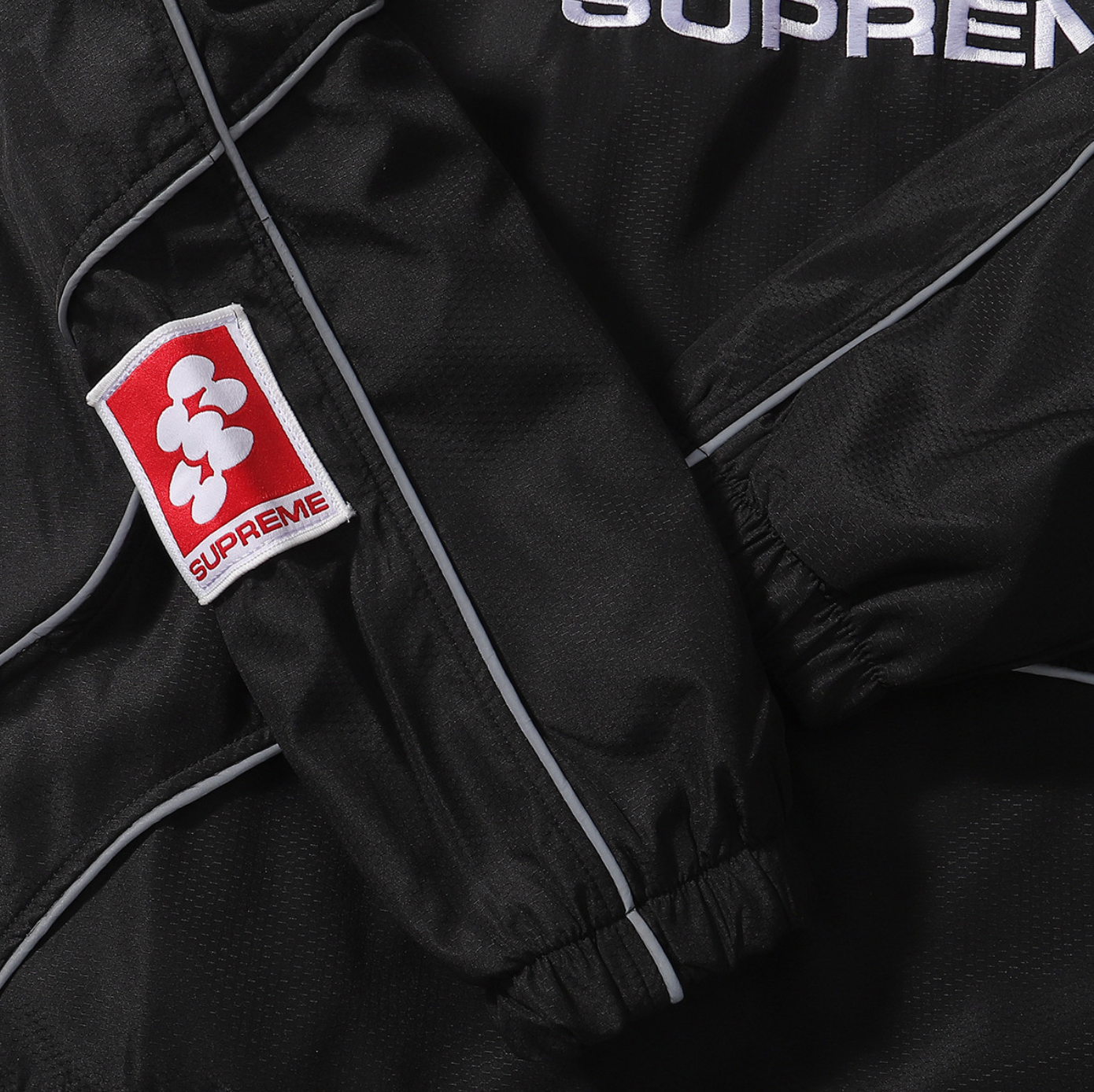 JACKET SUPREME REFLECTANTE