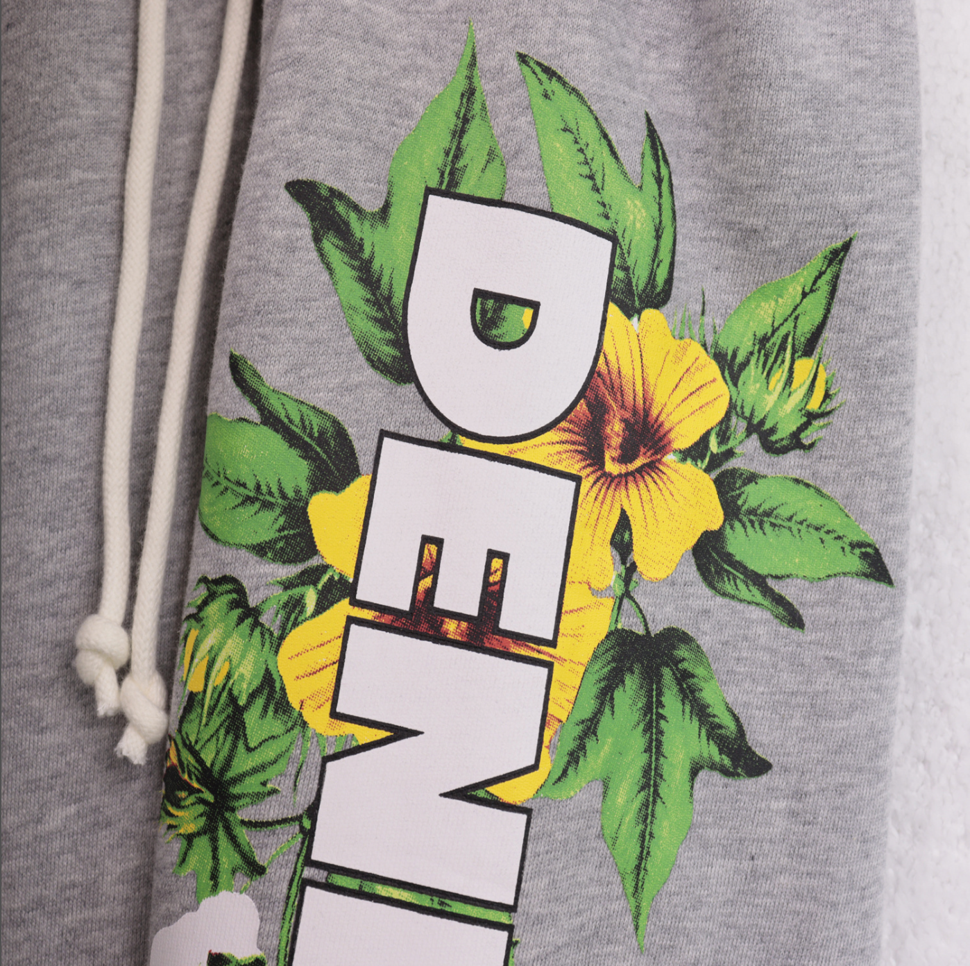 PANTS DENIM TEARS FLORAL LOGO