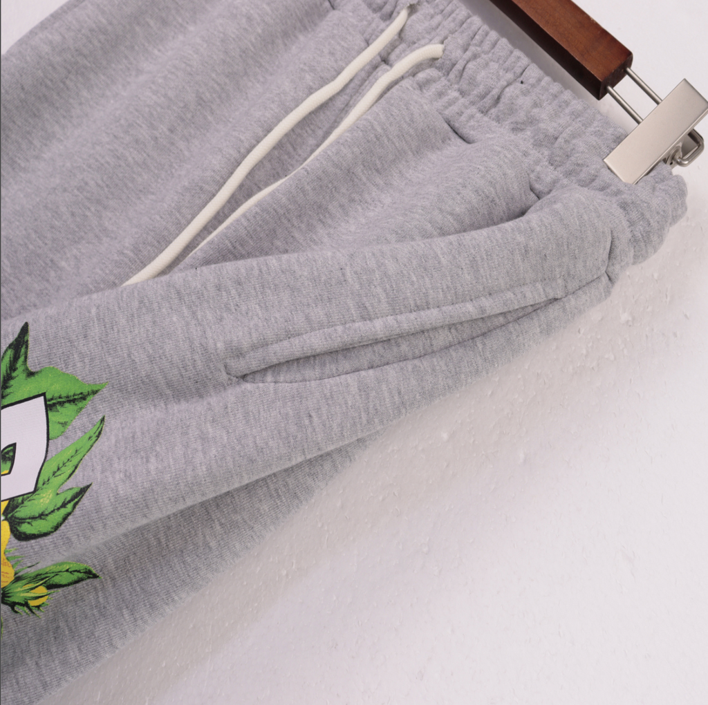 PANTS DENIM TEARS FLORAL LOGO