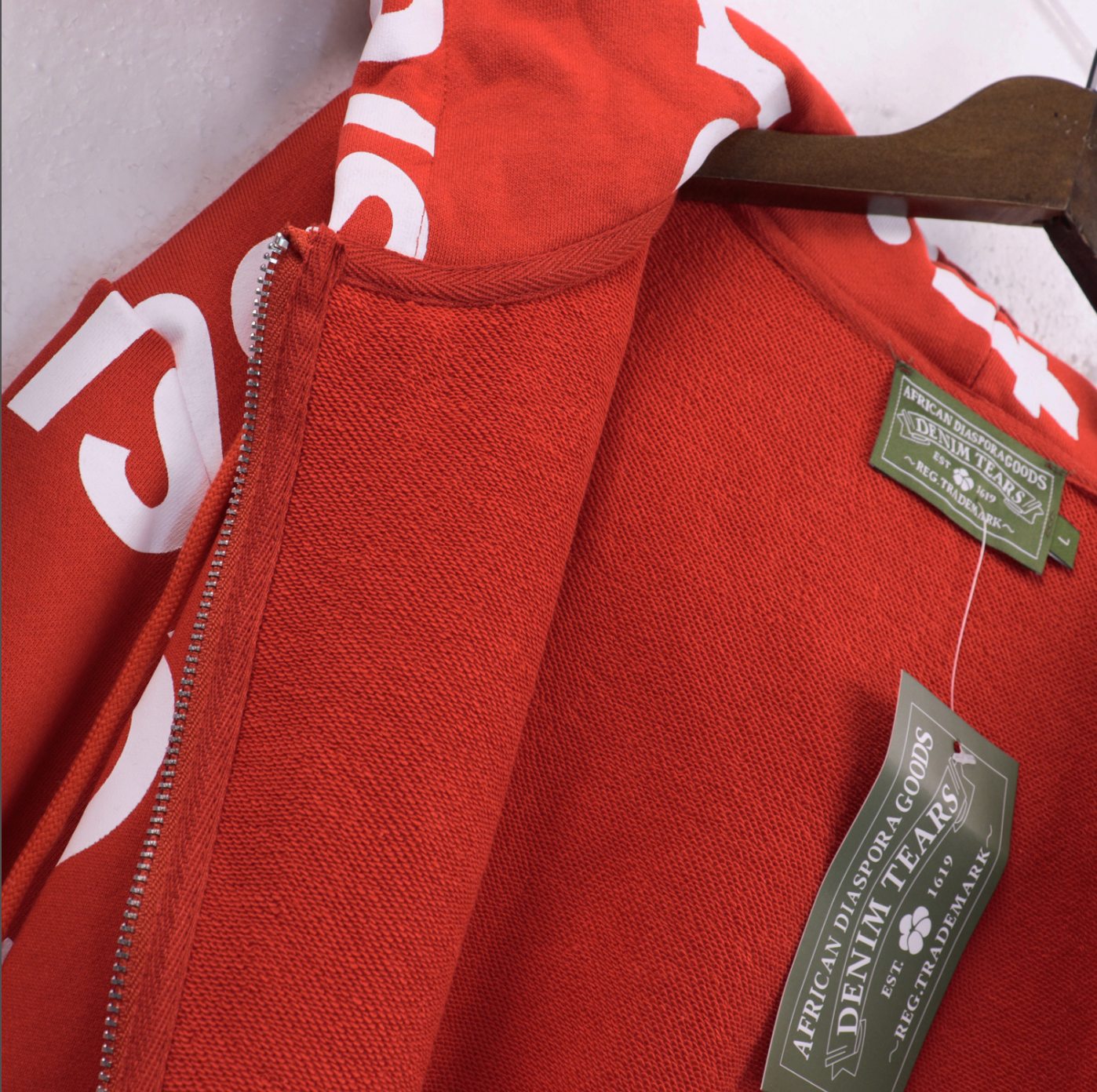 HOODIE ZIPPER DENIM TEARS SYSTEMIC RACISM CONTROLS AMERICA