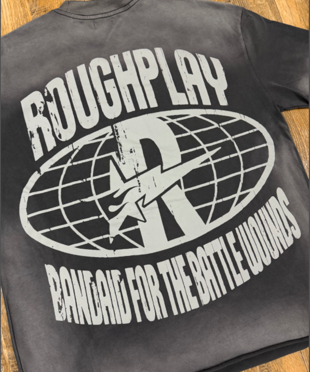 PLAYERA ROUGH PLAY BANDAID FOR THE BATTLE