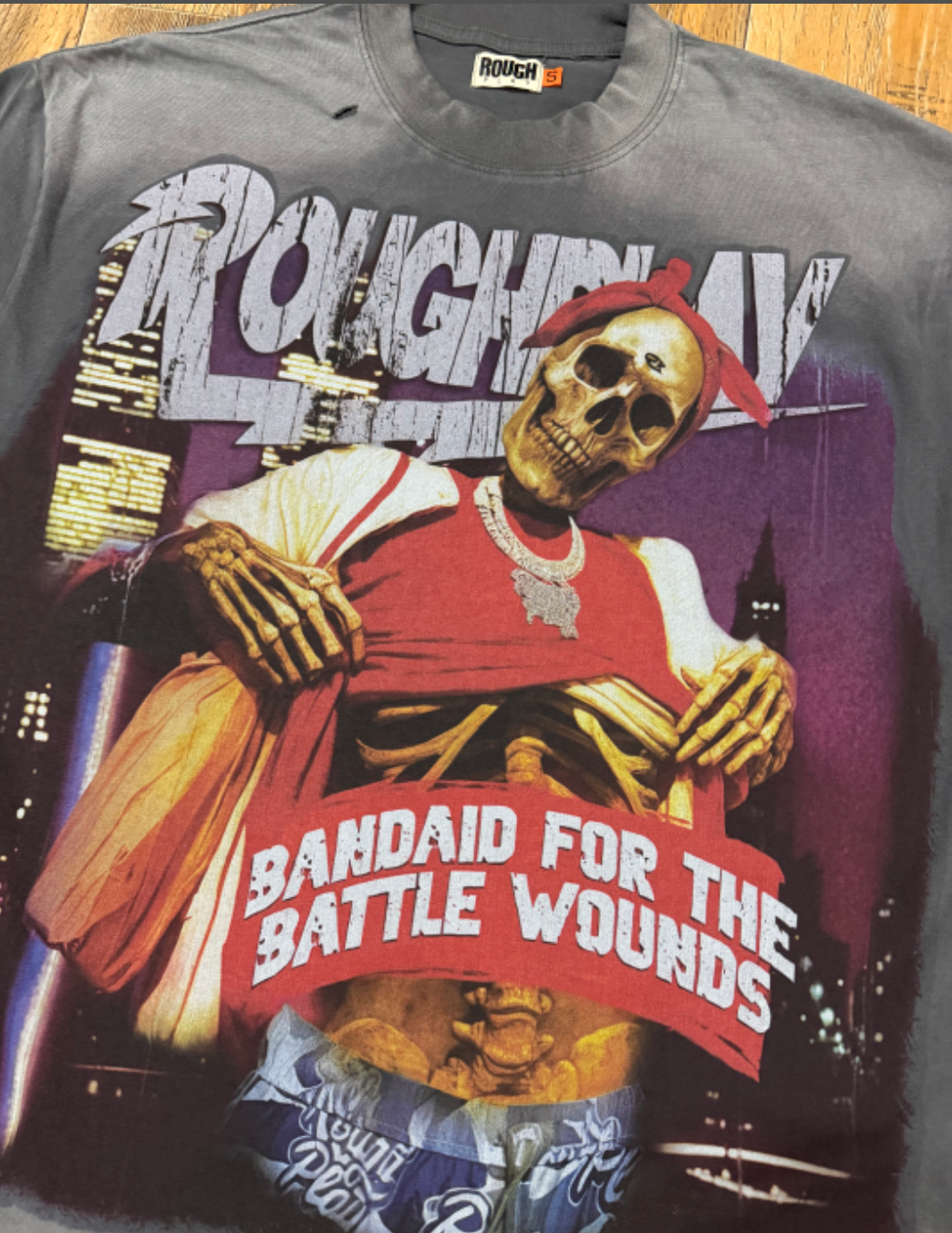 PLAYERA ROUGH PLAY BANDAID FOR THE BATTLE