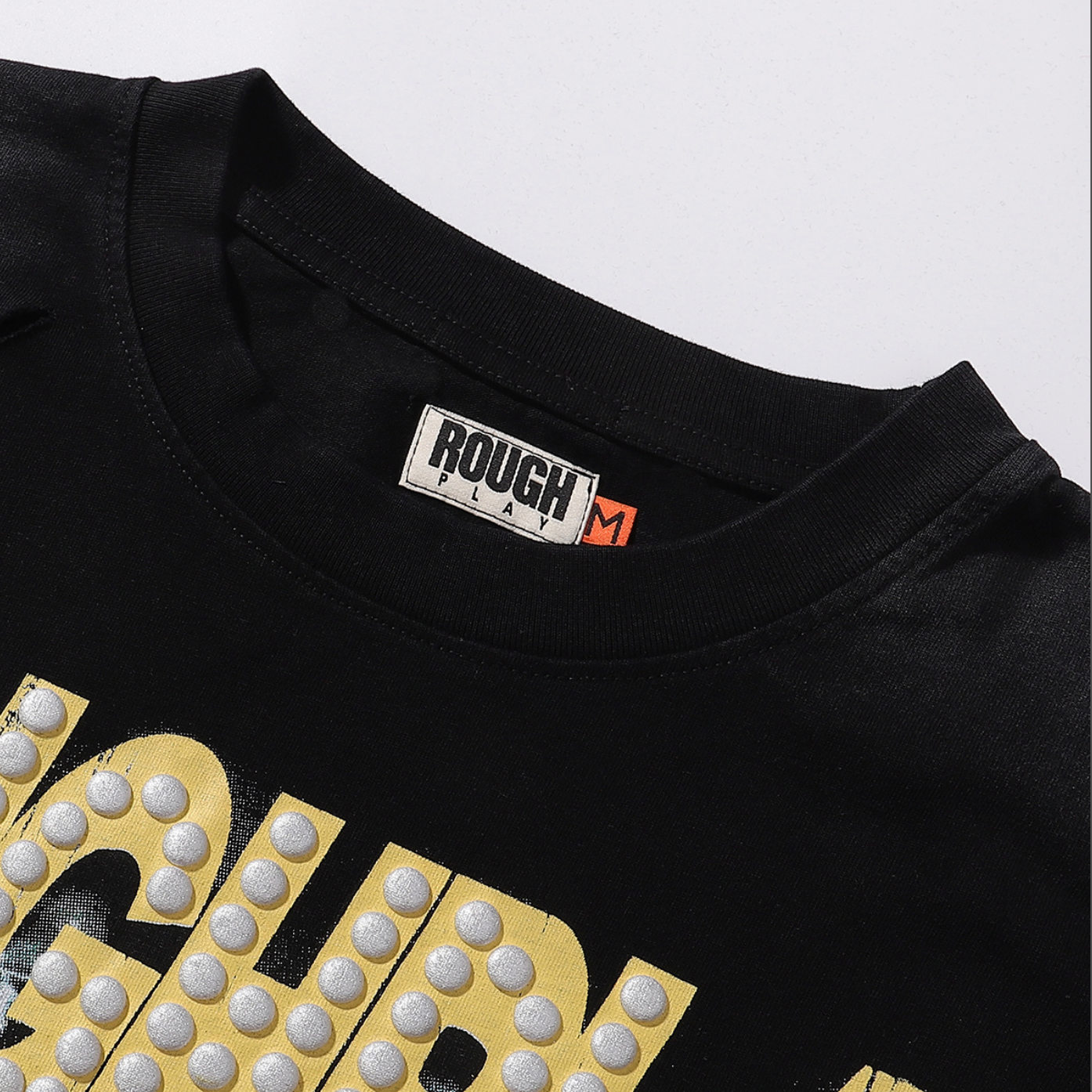 PLAYERA ROUGH PLAY BANDAID FOR THE BATTLE
