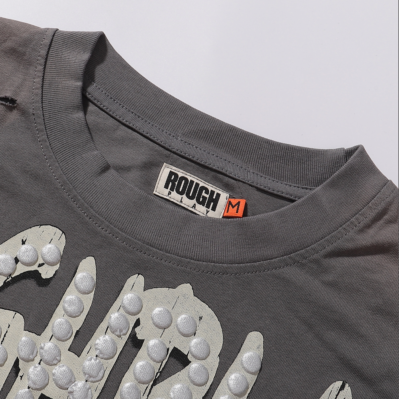 PLAYERA ROUGH PLAY BANDAID FOR THE BATTLE